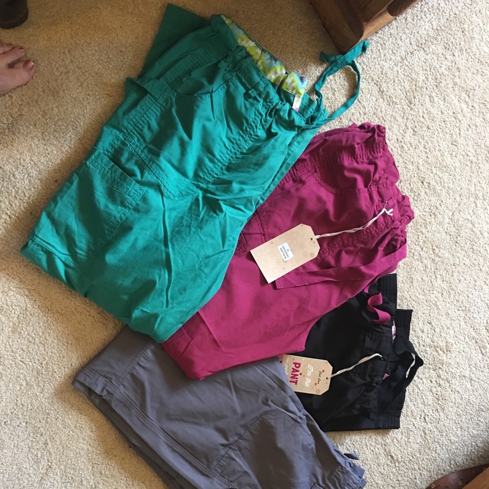 4 pair nursing scrubs brand new never worn